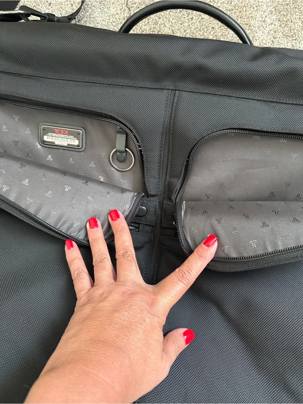 Tumi Bifold Black Travel Garment Bag with Multiple Front Pockets
